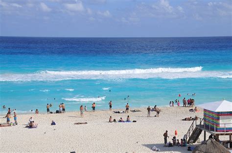 which resorts in cancun allow topless at pools or beach